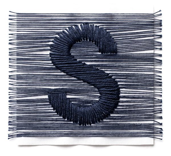 The SuperLoom S, embroidered in thread on fabric.